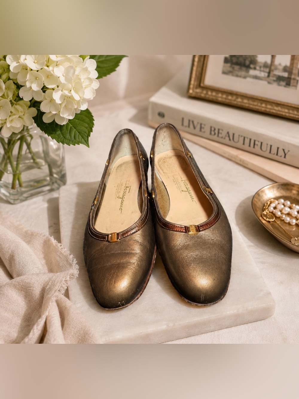 Salvatore  Ferragamo vintage bronze flats with gold logo hardware womens…